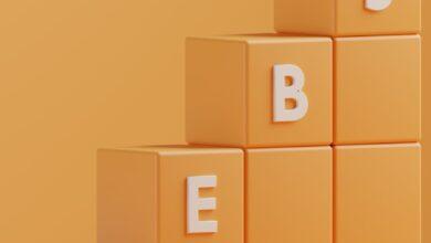 a 3d rendering of a pyramid of blocks with the letters e, b, e