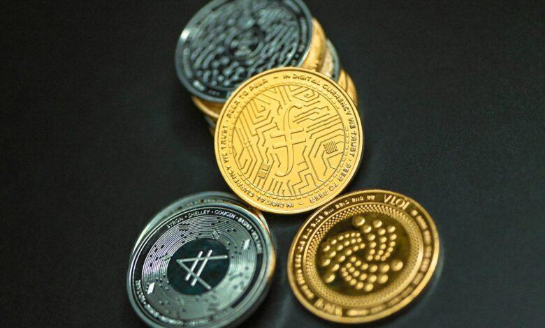 a group of coins sitting on top of a table